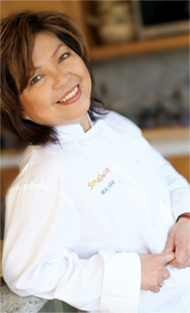 mai pham wearing a chefs coat that says Star Ginger